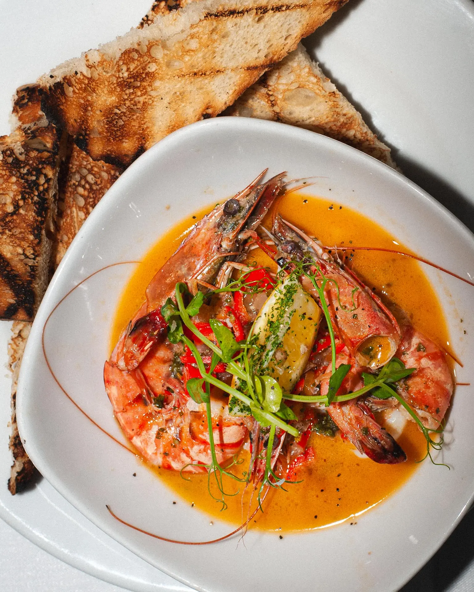 Prawns served with toasted bread